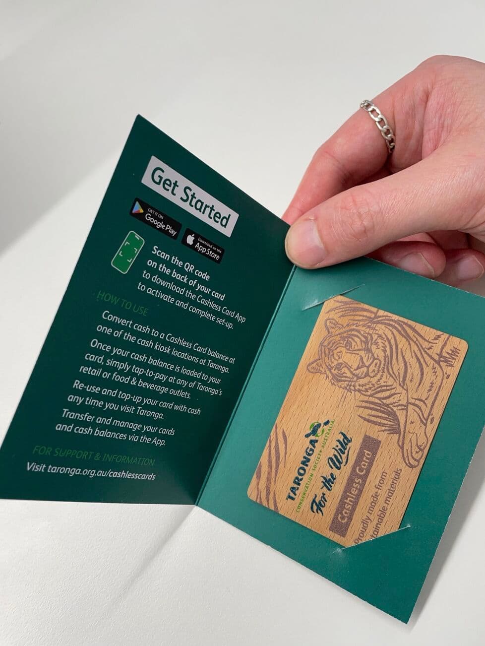 Taronga Zoo wooden cashless card and onboarding collateral.